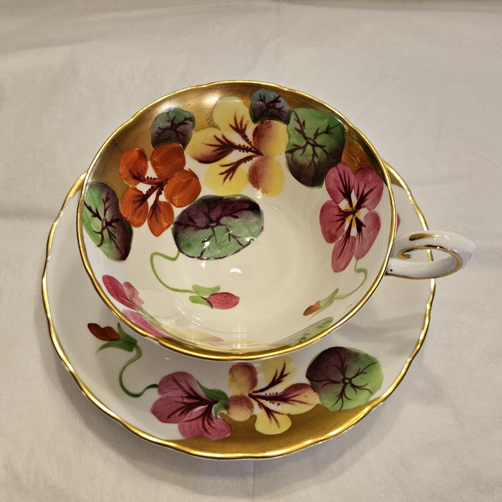 Gorgeous hand-painted Vintage Cup and Saucer by Tuscan Bone China England.
